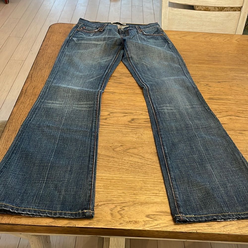 COLINS FLARE BLUE JEANS.  W 27 L 33.  NEW WITH TAGS